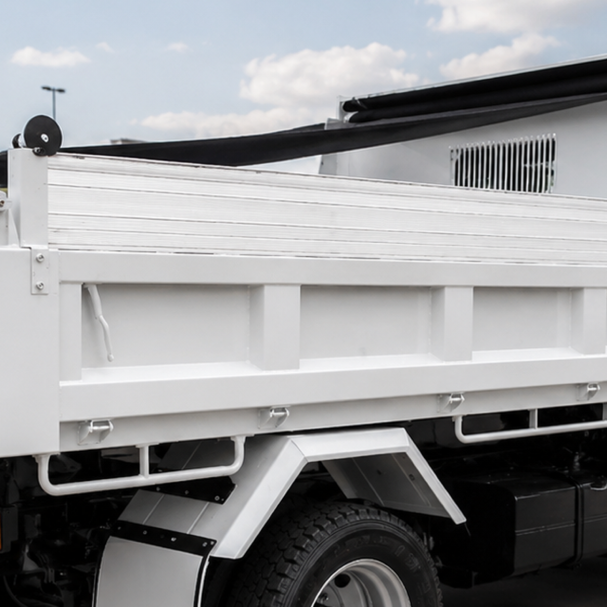 Illustrative image — aluminium hungry board fitted along the top of a tipper side